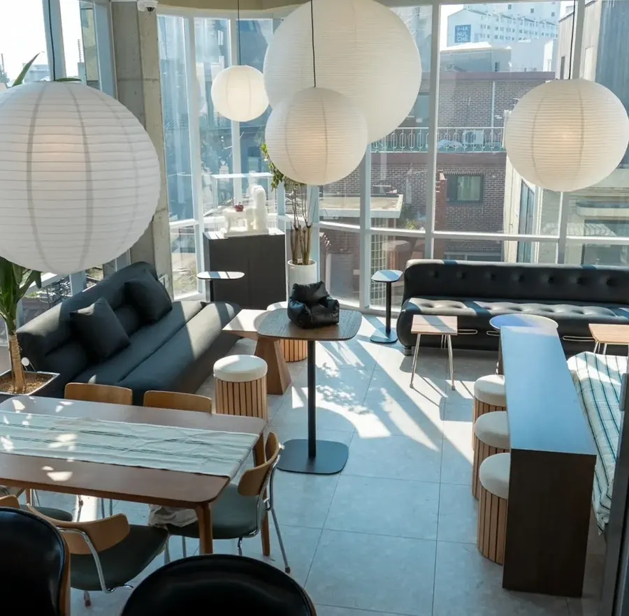 Seating area at Tipsy Couch with sofas and tables