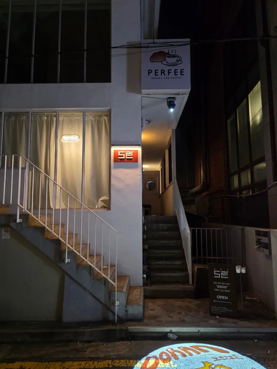 Wrapping up a visit to a Hongdae solo-drinking bar
