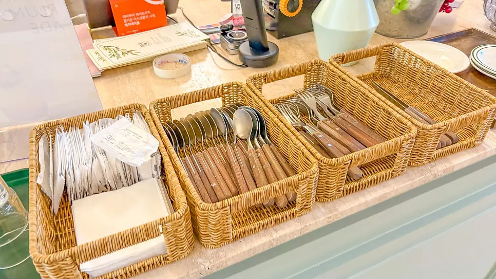 Self-serve cutlery and napkin corner