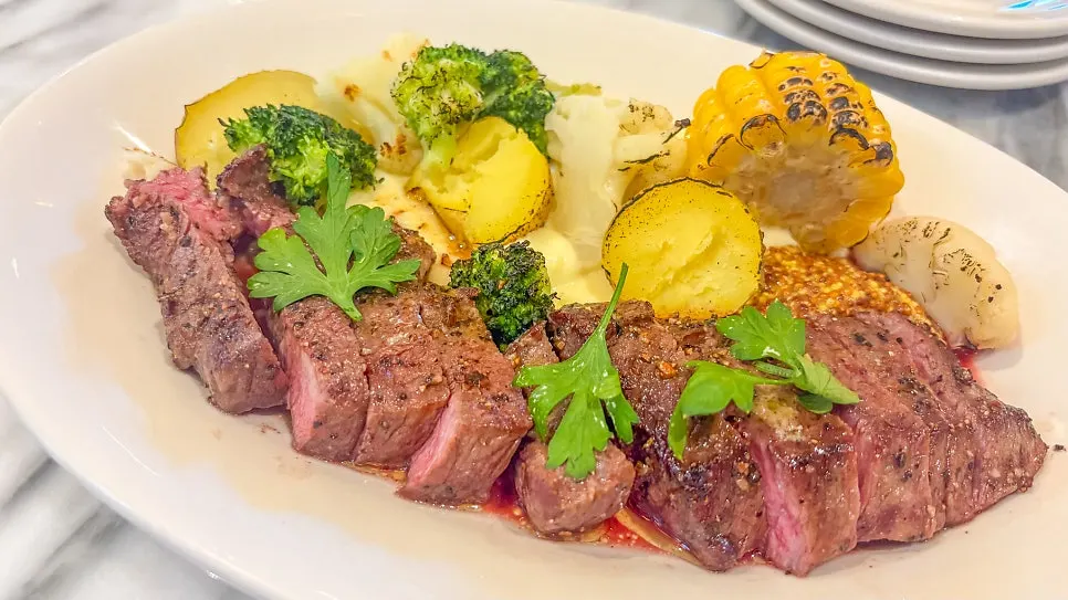 The served chuck tender steak plate