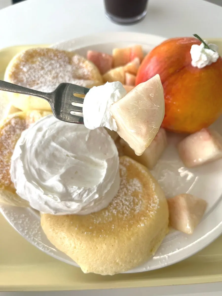 Coffee ordered alongside the peach soufflé