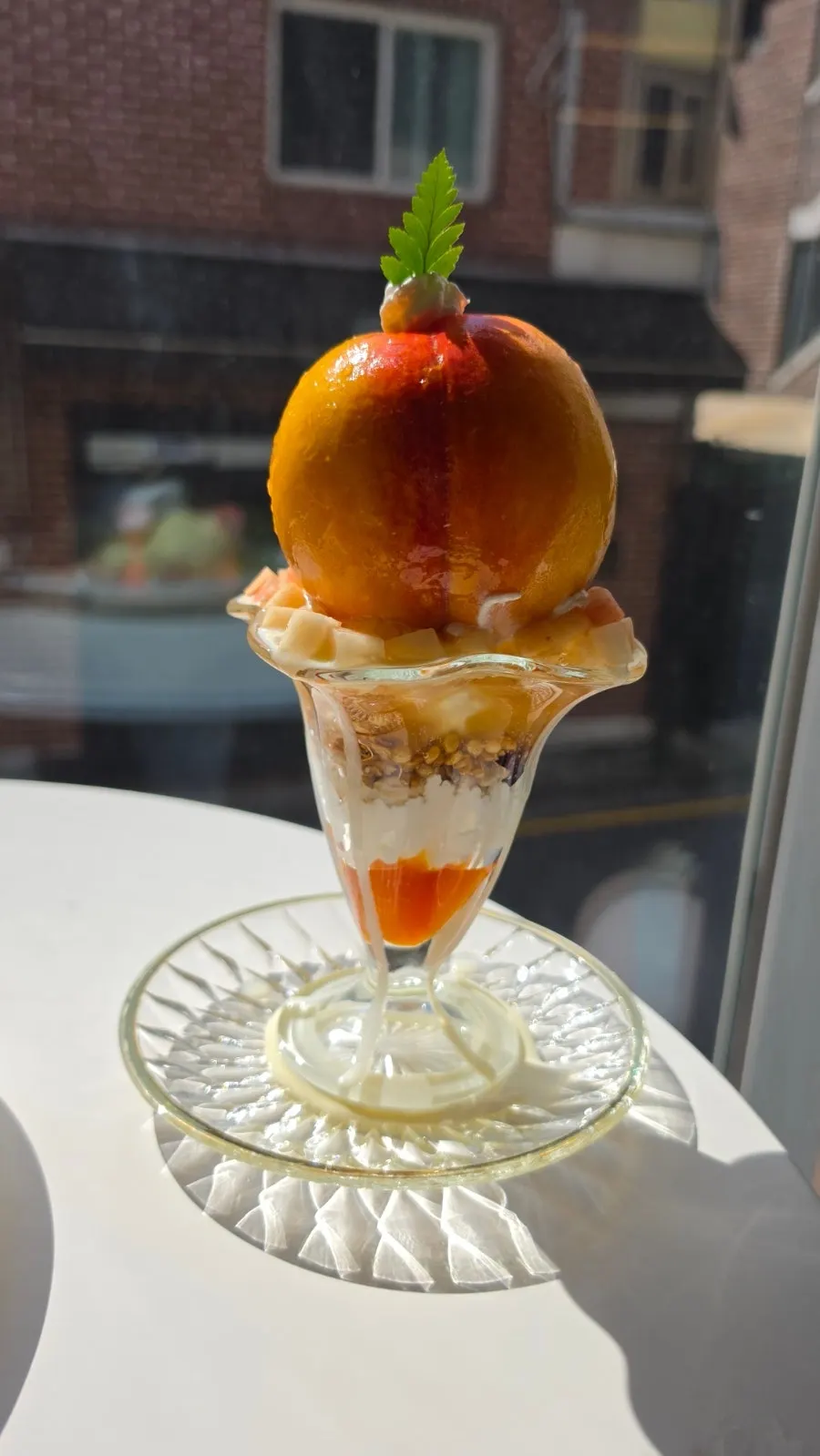 Whole peach Greek yogurt parfait