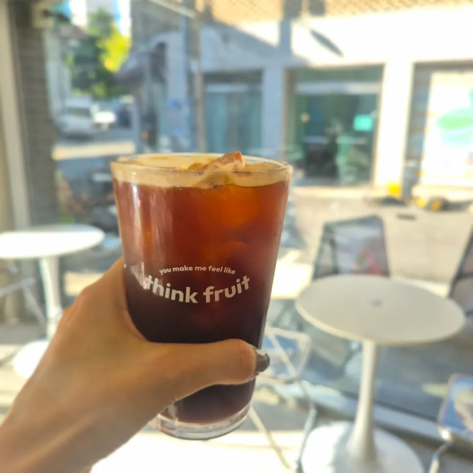 An iced Americano enjoyed alongside the dessert