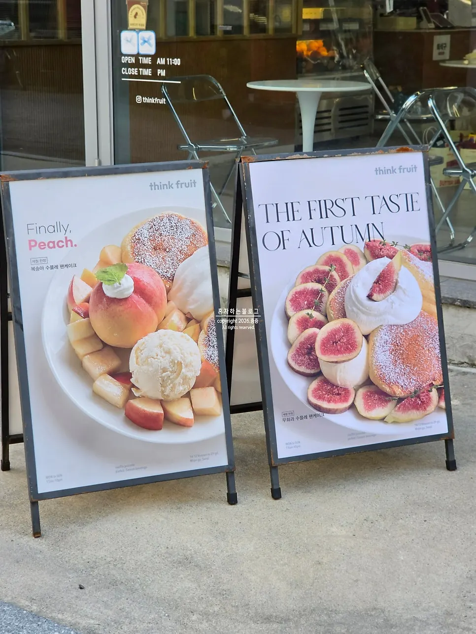 Soufflé dessert photos displayed outside Think Fruit's entrance