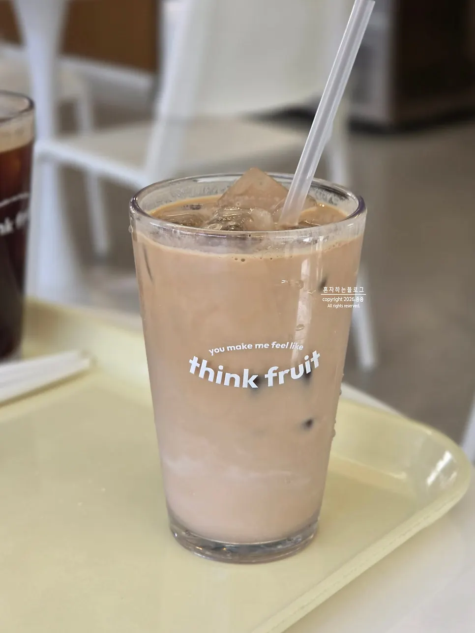 Close-up of Think Fruit's caffè latte