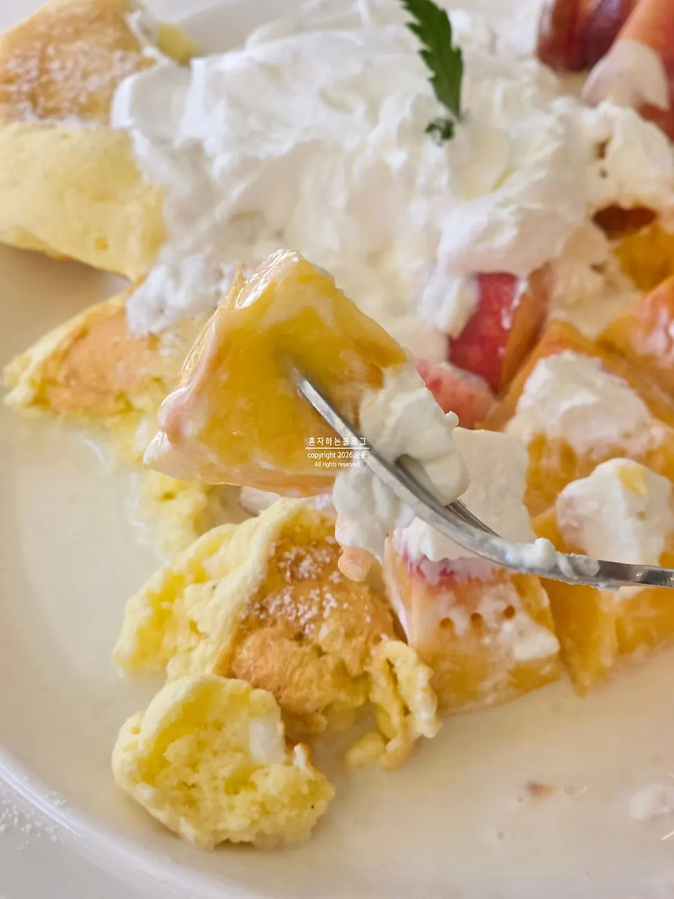 An emptied plate after the peach soufflé