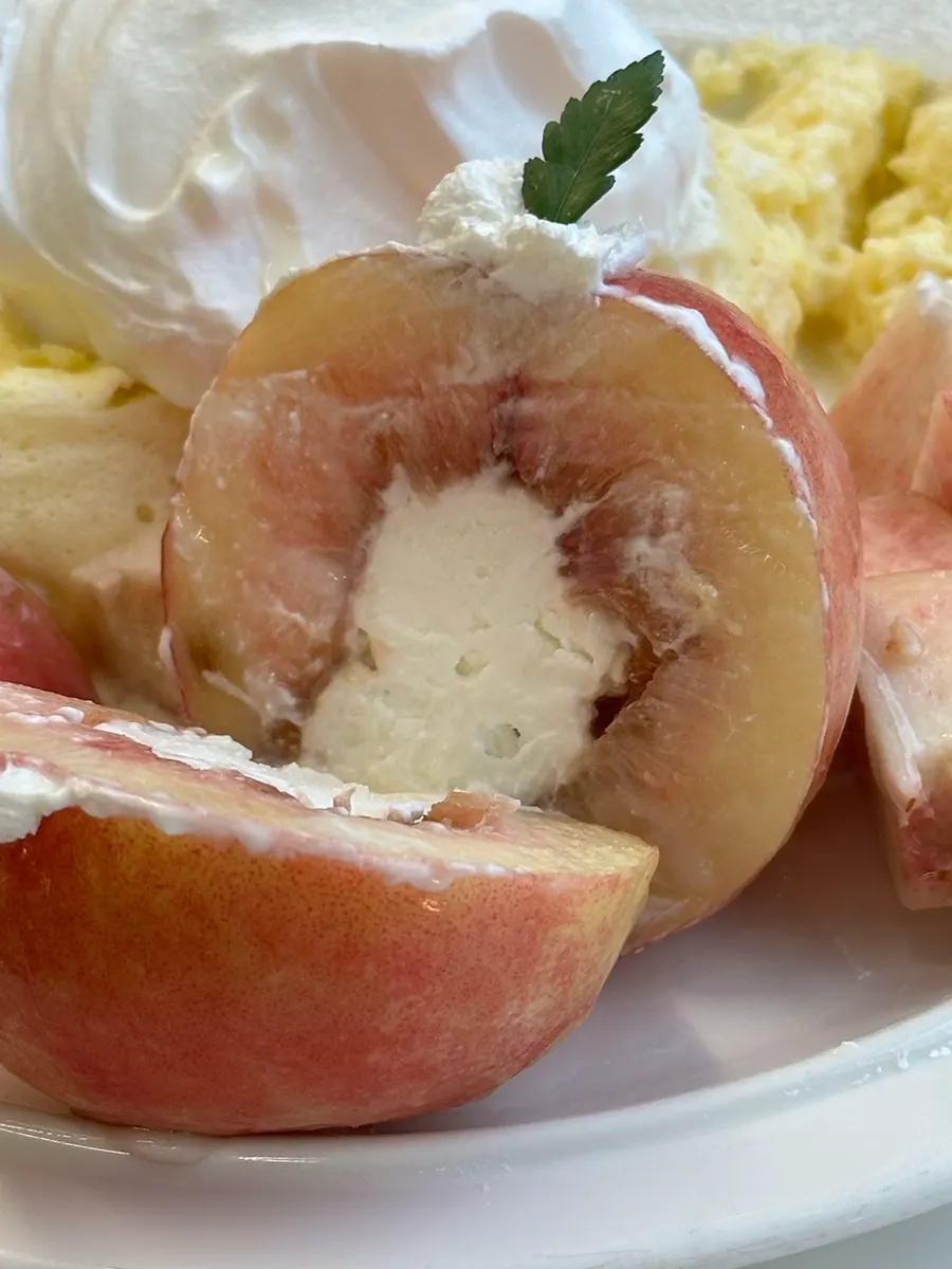 Whole peach filled with Greek yogurt