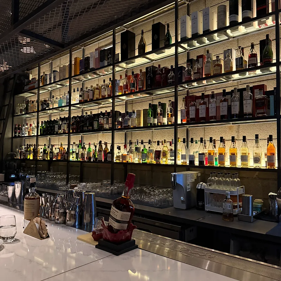 Interior of Bitters with bar seats and table seats
