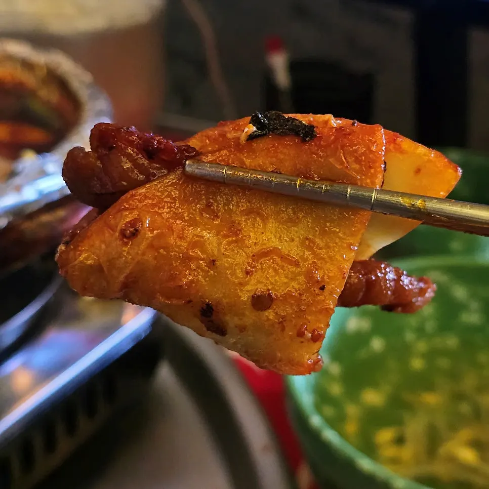 Chicken feet wrapped in napjak mandu