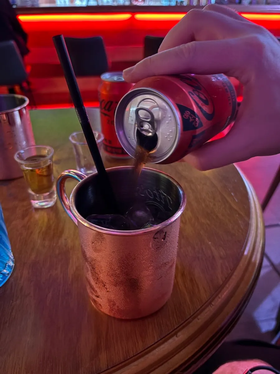 Drink served in a cup that stays cold for a long time