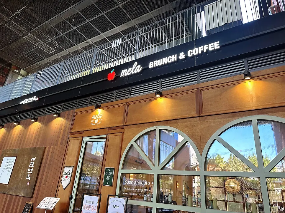 Exterior of MELA Hongdae in a Seogyo-dong alley