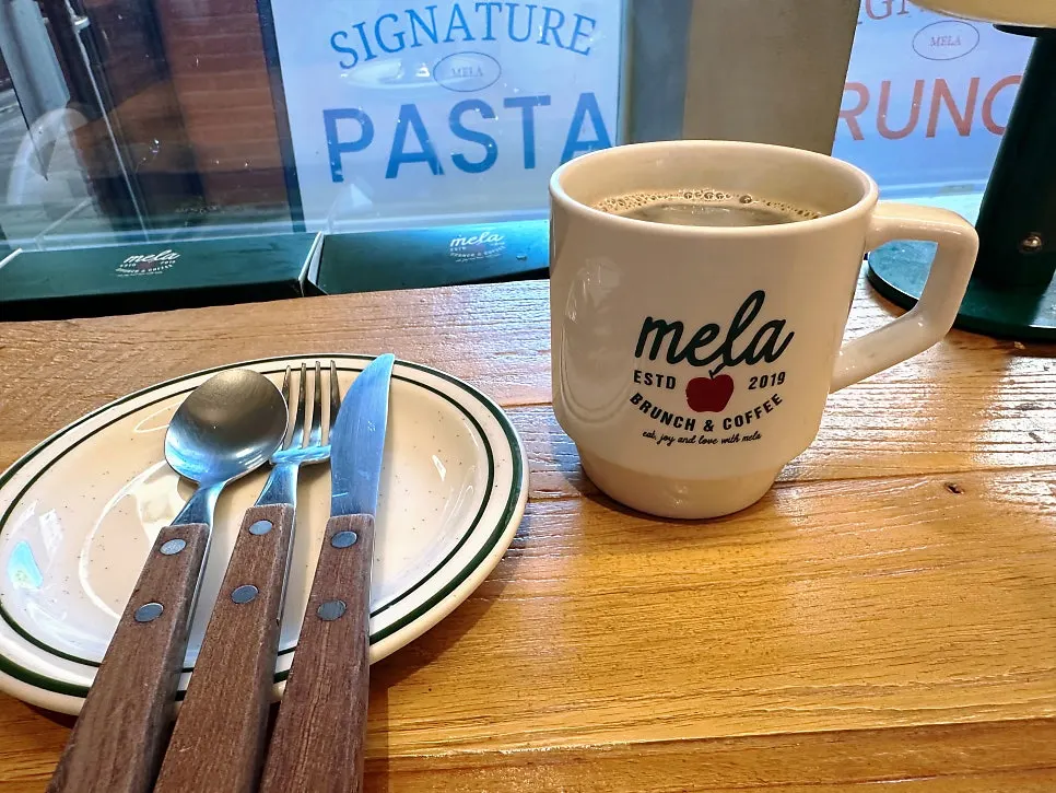 Customers entering the dining hall at MELA Hongdae