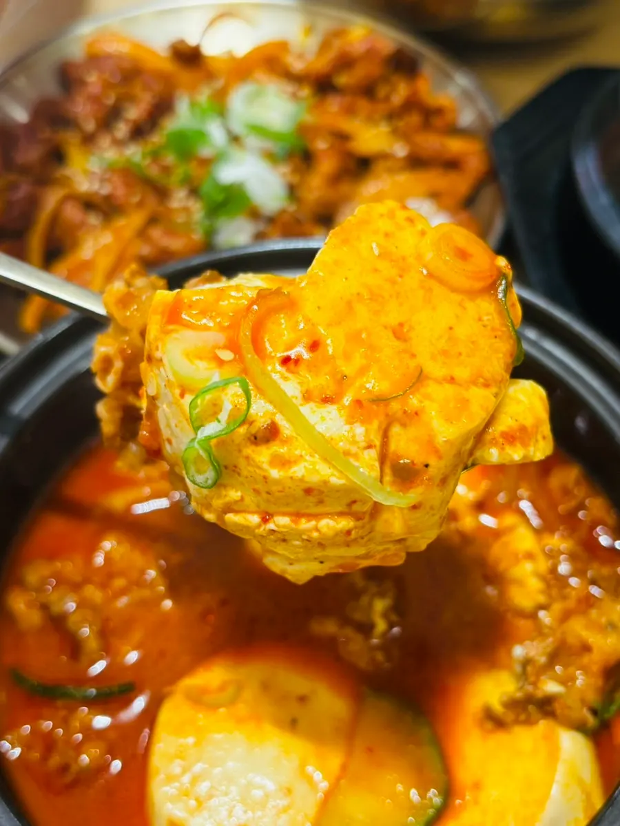 Glutinous black rice with sundubu-jjigae
