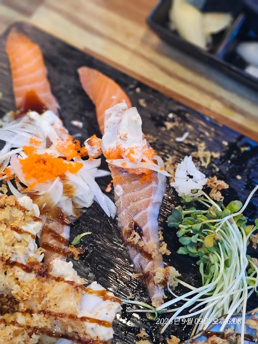 Yu Iksang Sushi's long-tail sushi, with fish draping longer than the rice