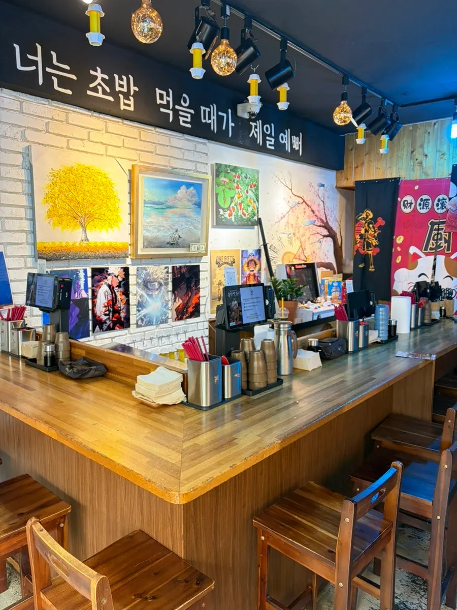Yu Iksang Sushi interior decorated with cartoon characters