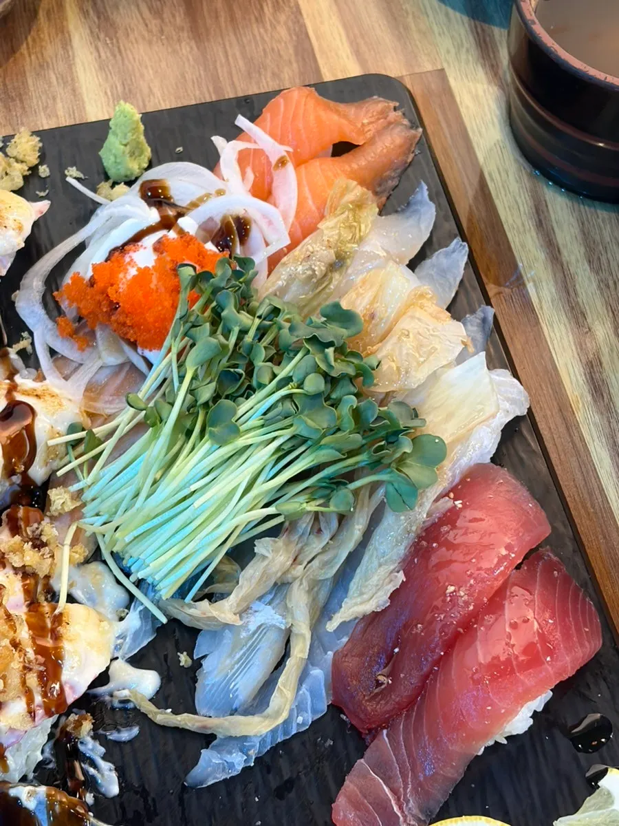 Thick, extra-long salmon sushi