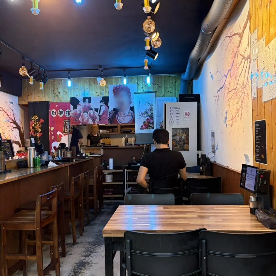 Interior with counter seating and table seating