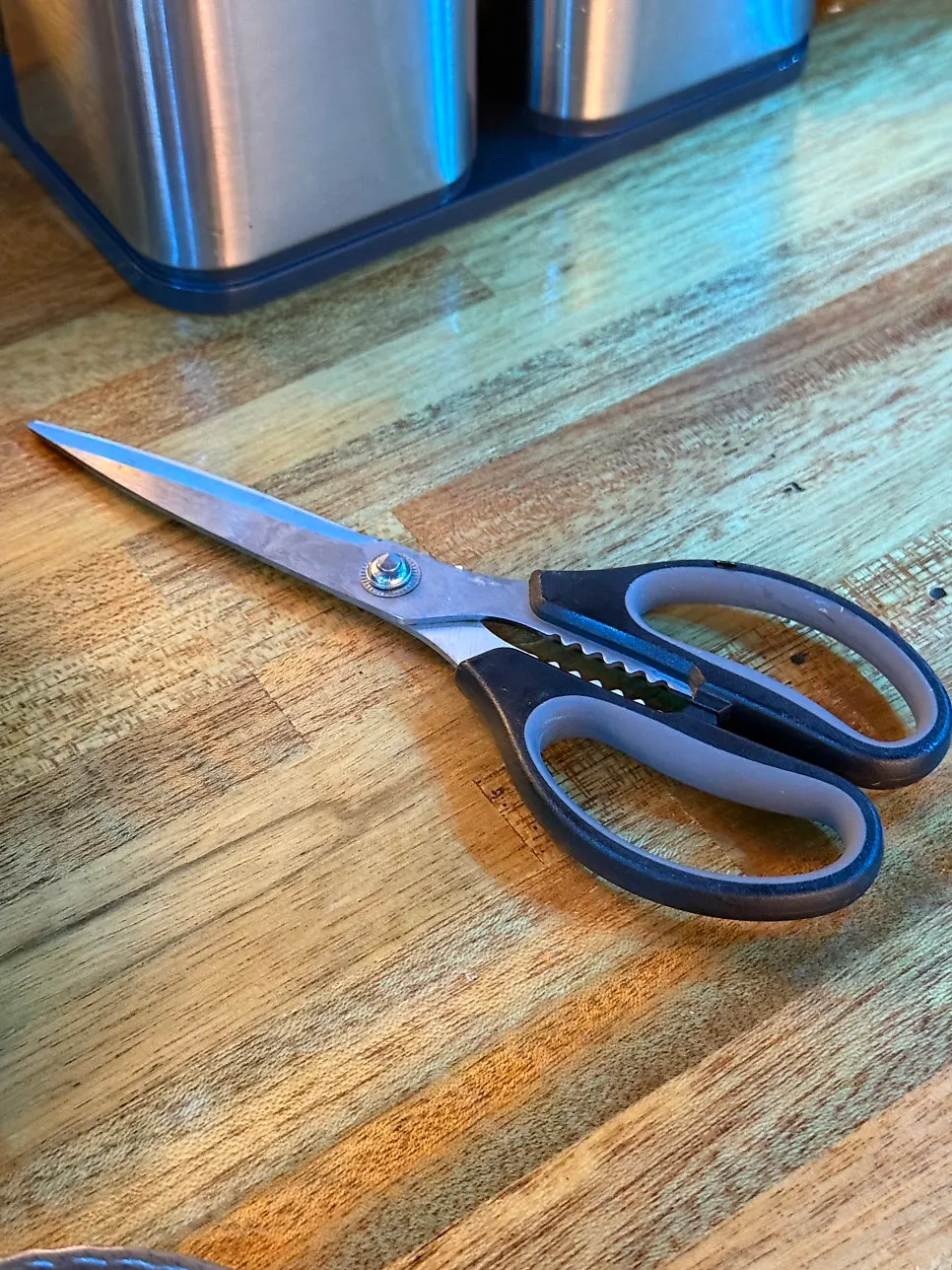 Soy sauce brush and scissors set on the table