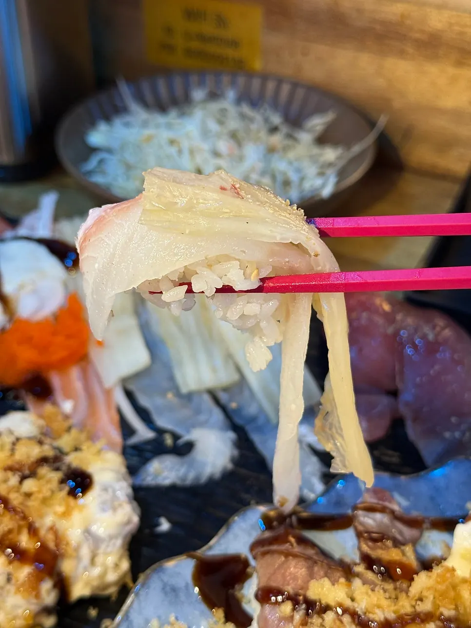 Flounder sushi with a similarly long tail