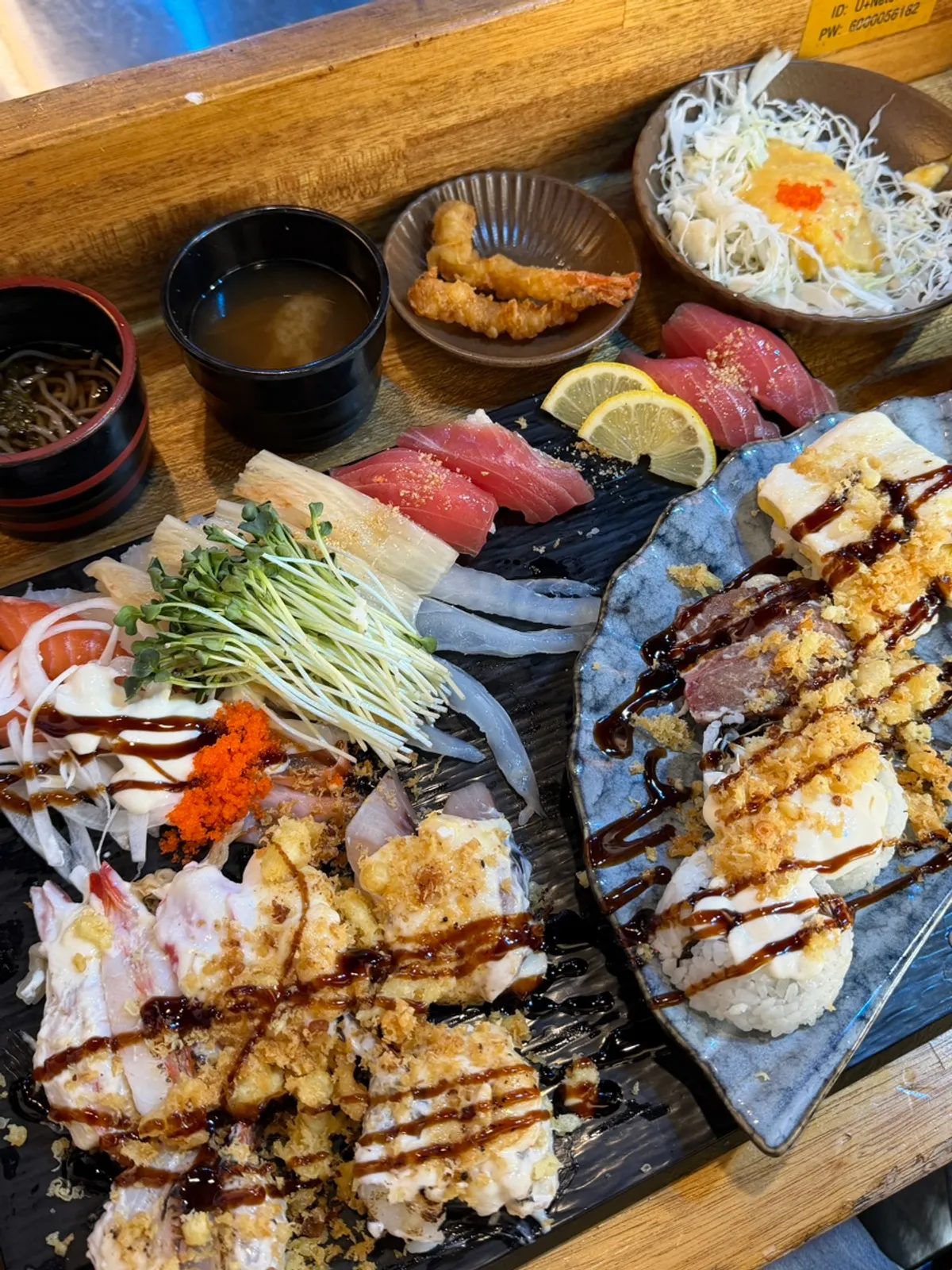 Long-tailed sushi with fish extending over the rice