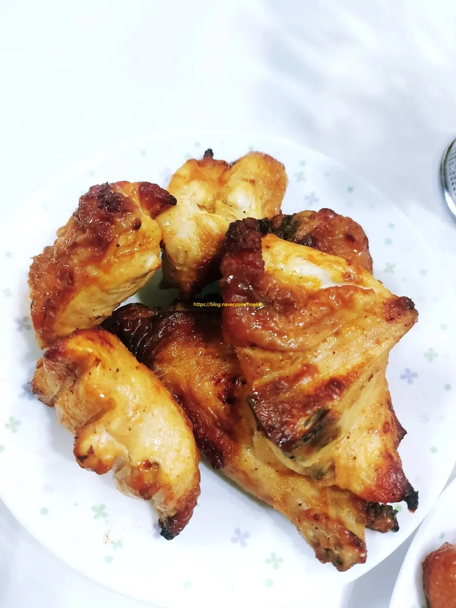 Takeout chicken spread served with pickled radish