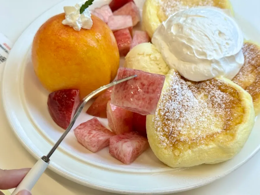 A piece of the soft soufflé bread