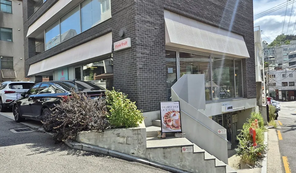 Think Fruit's Hongdae exterior with a large window
