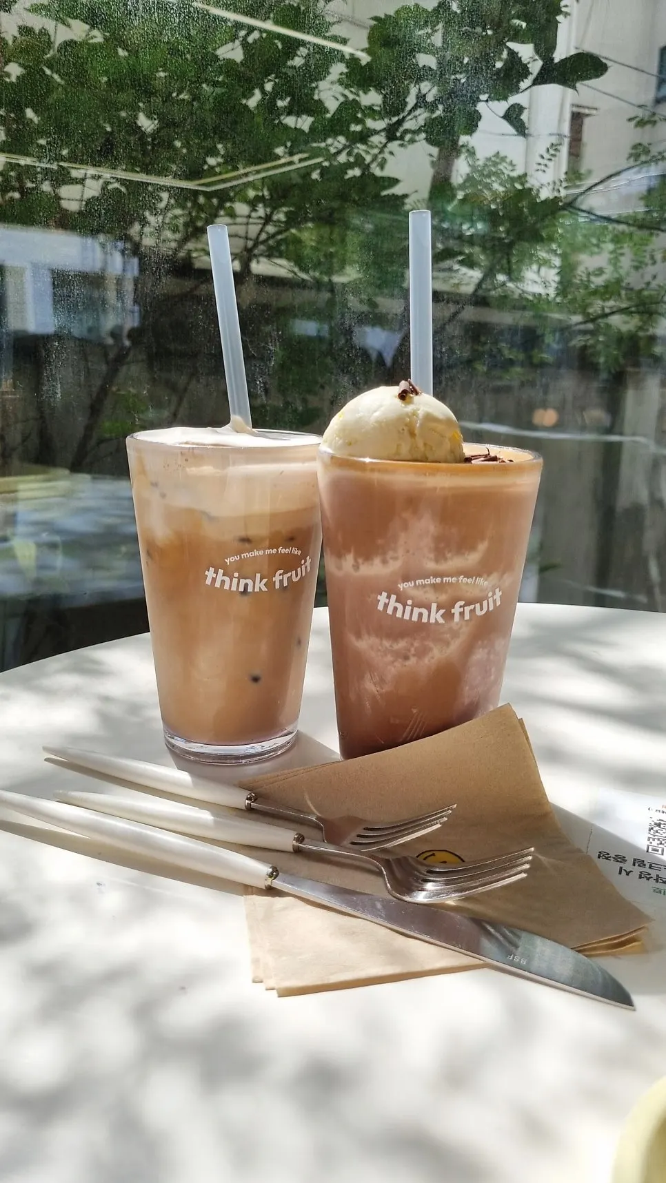 Two cups of Think Fruit's choco-coffee slush and salted cream milk tea