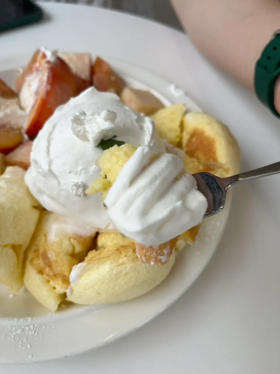 Cream and vanilla ice cream served with the soufflé
