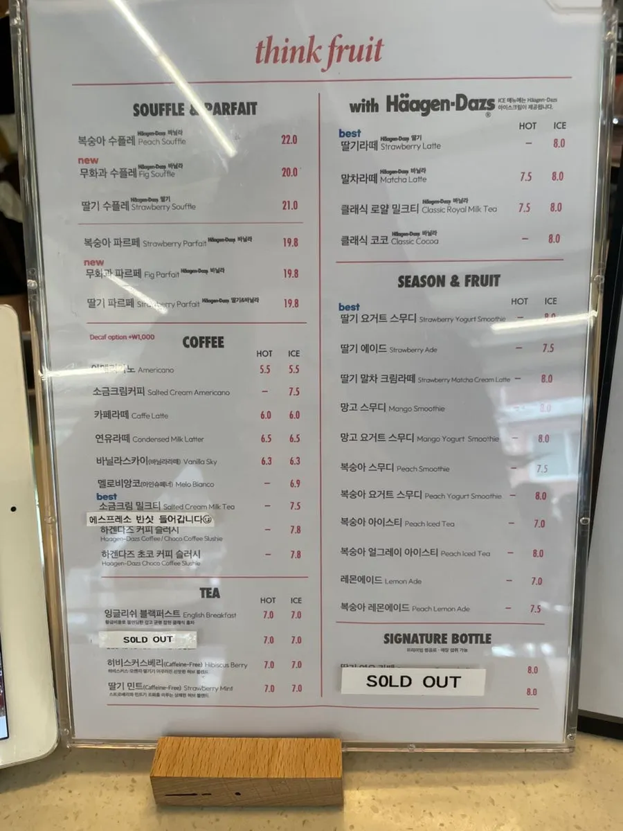 Think Fruit's menu board listing seasonal fruit soufflés and drinks