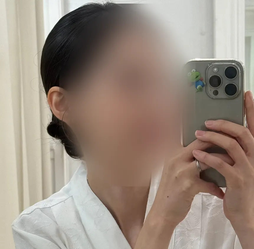 Low bun yang serasi dengan makeup pengantin