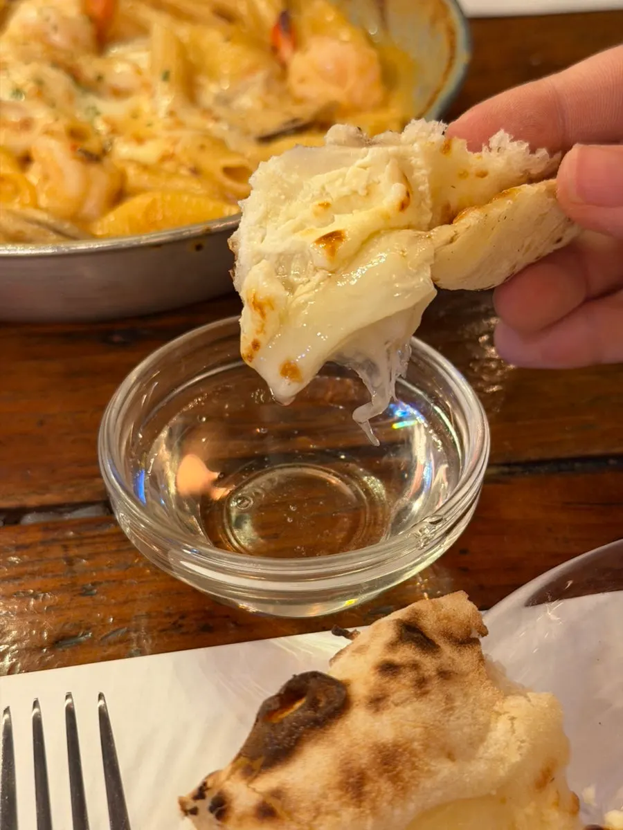 Light, puffed-up crust ends of the pizza