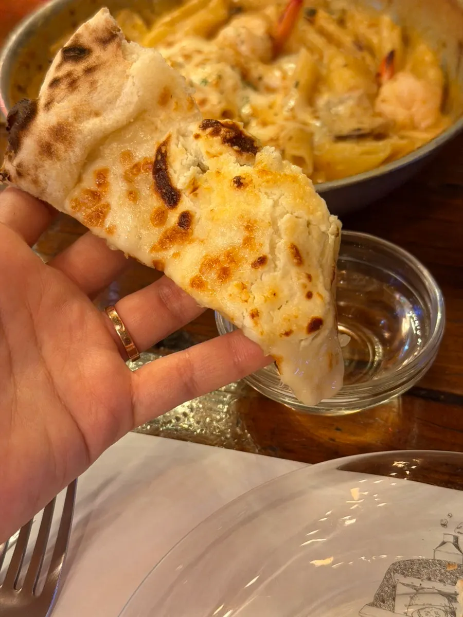 Honey served alongside the pizza