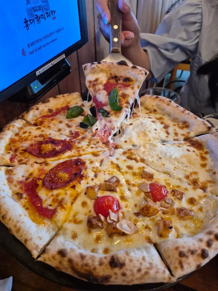 A whole Quattro Stagioni pizza