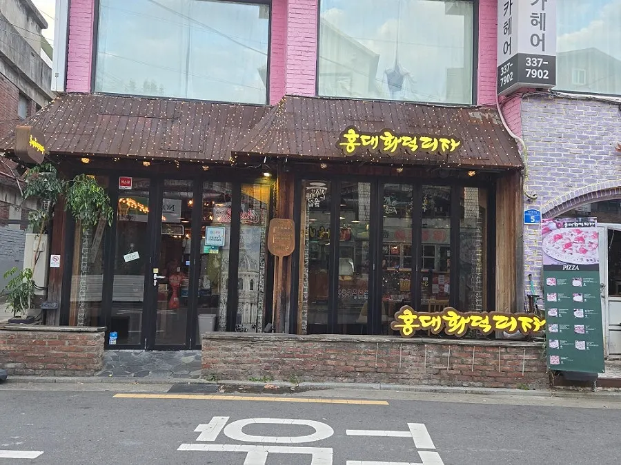 Exterior view of Hongdae Hwadeok Pizza in Hapjeong