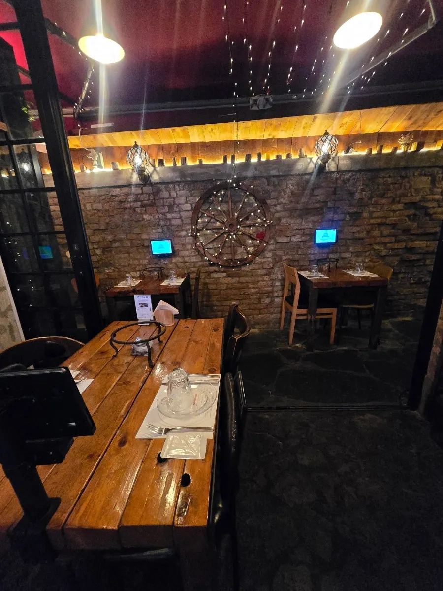The area around the entrance of Hongdae Hwadeok Pizza