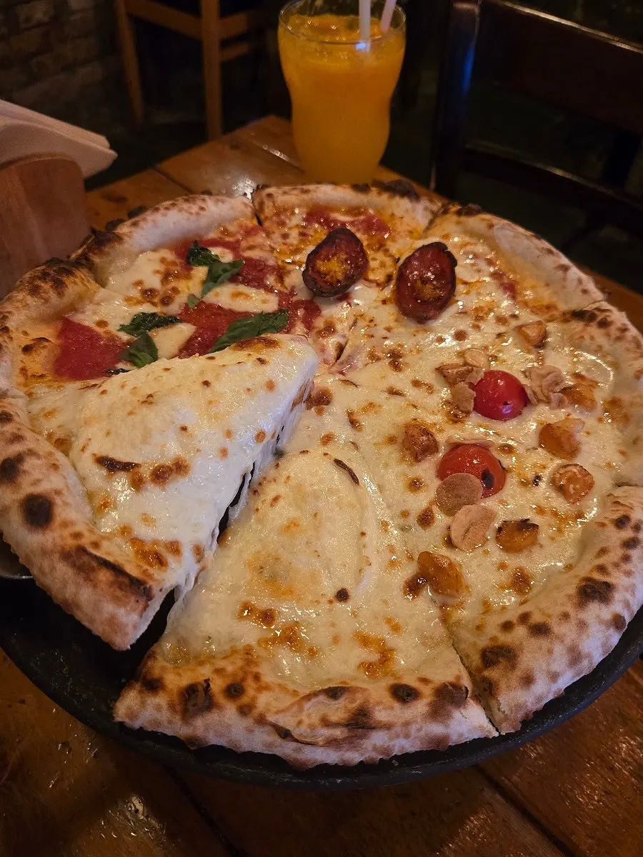 Four-flavor Quattro Stagioni wood-fired pizza