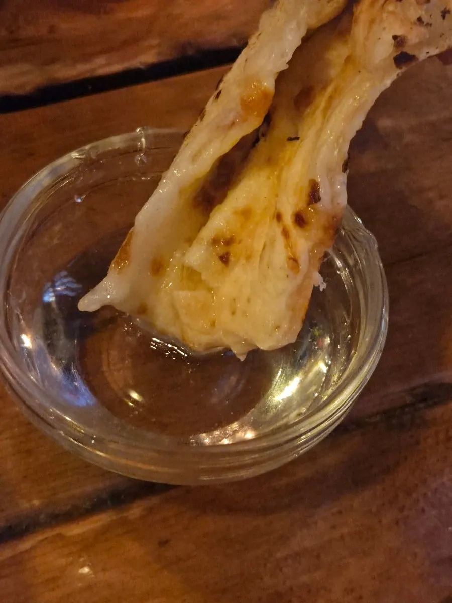 Close-up of freshly baked wood-fired pizza