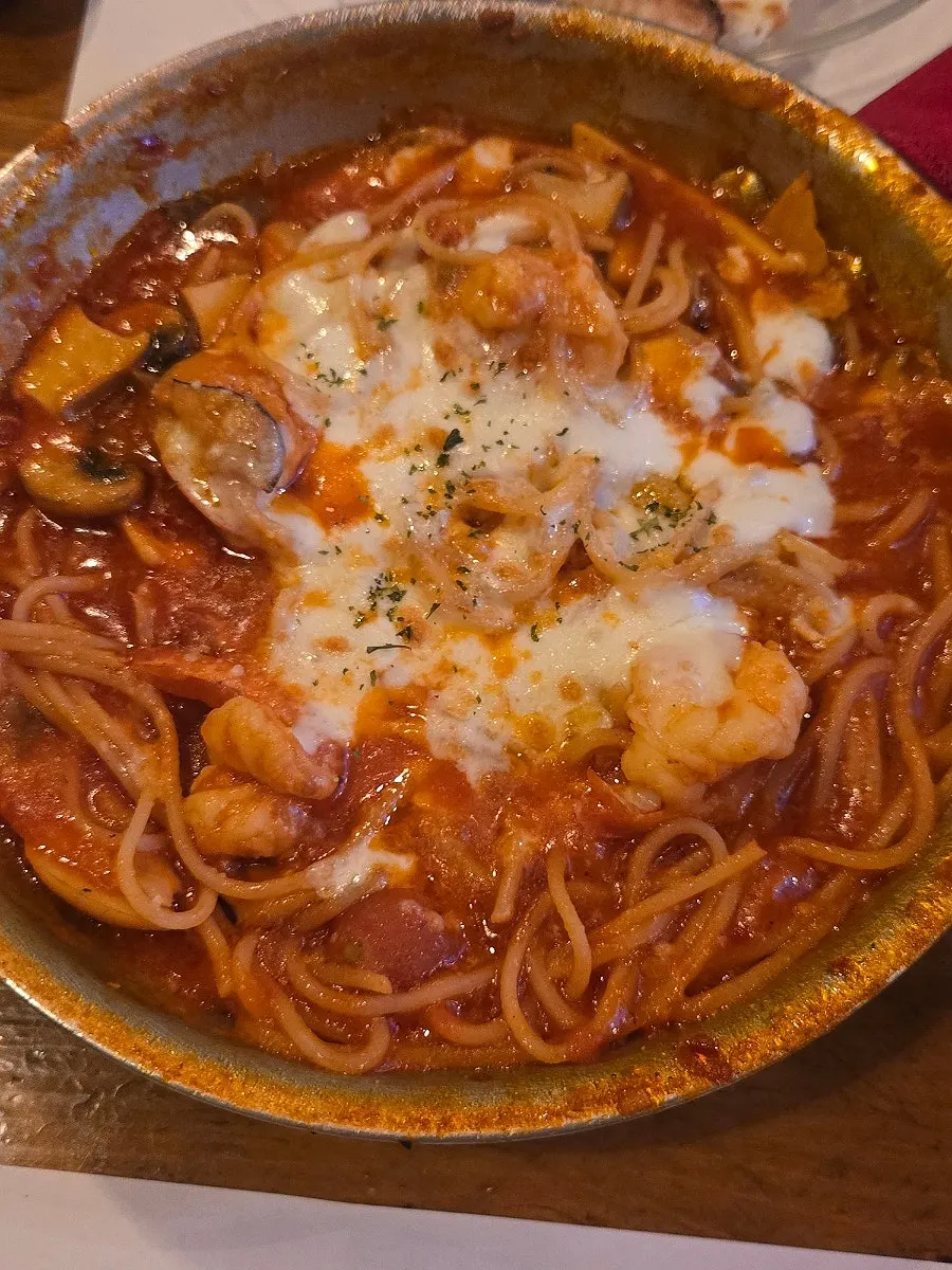 Margherita pizza slice with rich tomato sauce