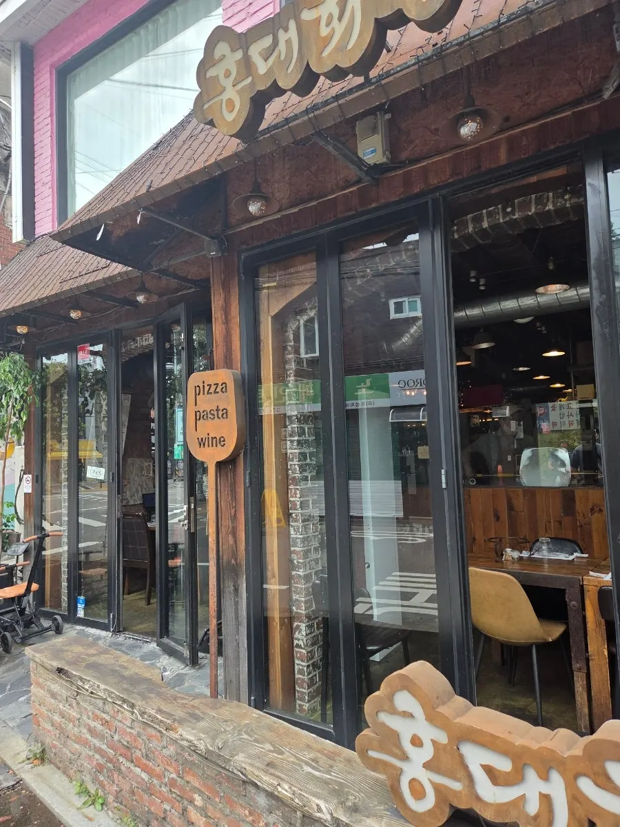 Entrance view of Hongdae Hwadeok Pizza near Hapjeong Station
