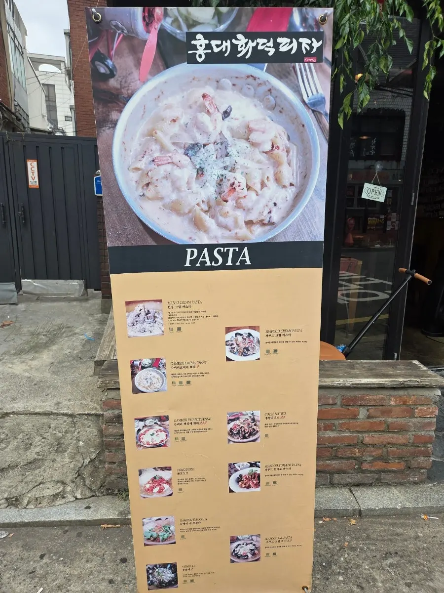 Window terrace seats at Hongdae Hwadeok Pizza that open up