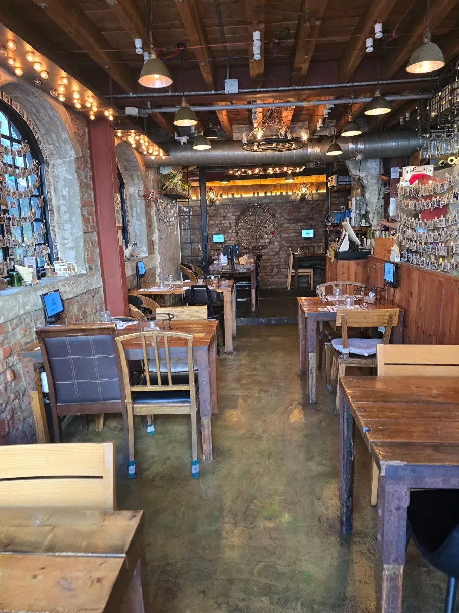Street view near the entrance of Hongdae Hwadeok Pizza