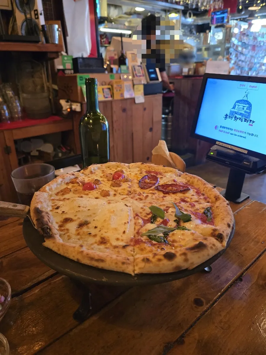 Table set with both pizza and pasta together