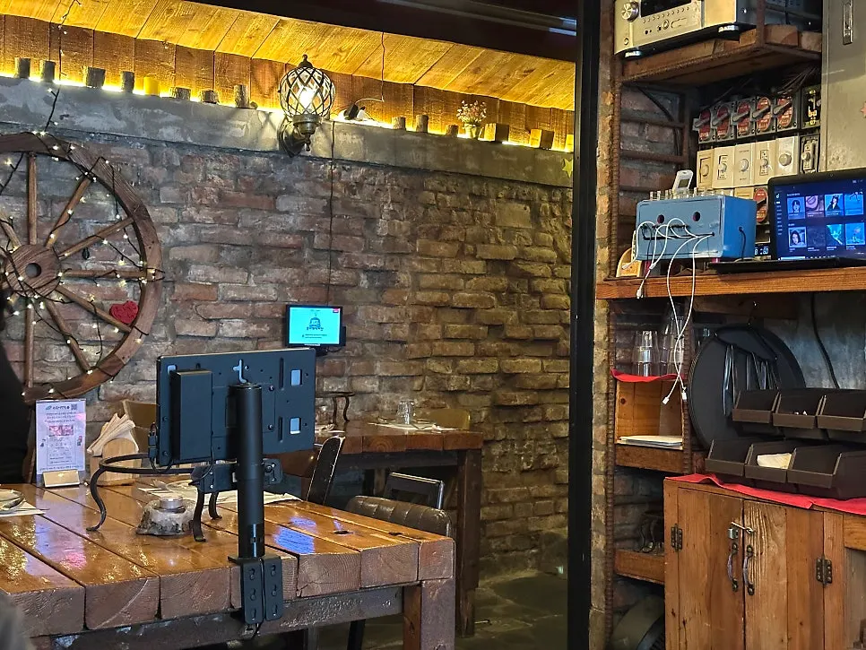 Interior featuring striking red brick