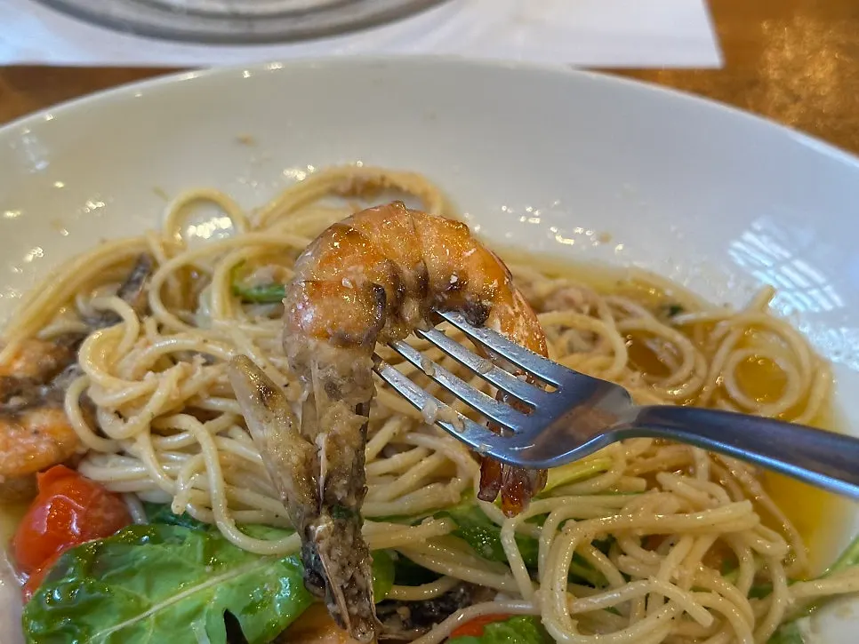 Detail of shell-on grilled whole shrimp
