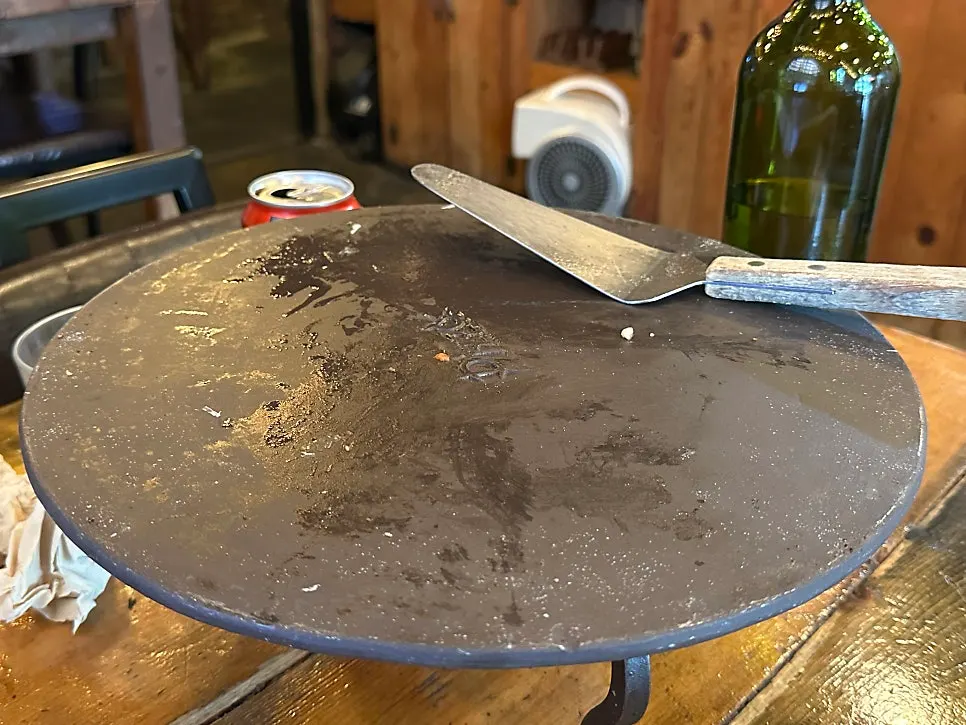 Empty plates after finishing the pizza and pasta