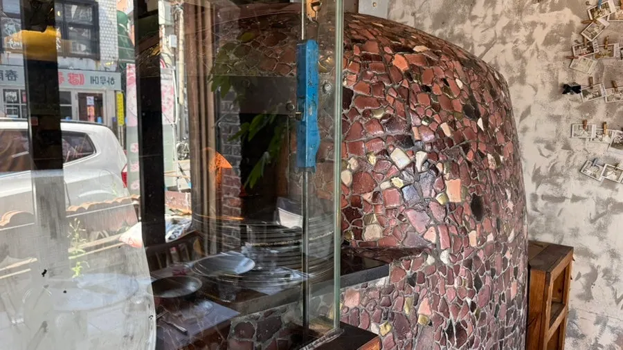 The Mount Vesuvius volcanic stone oven set in one corner of the restaurant