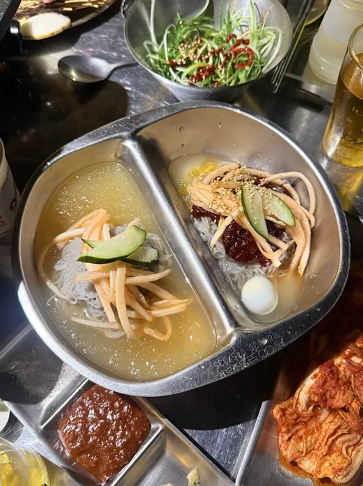 Bowl of half-and-half naengmyeon included in the set
