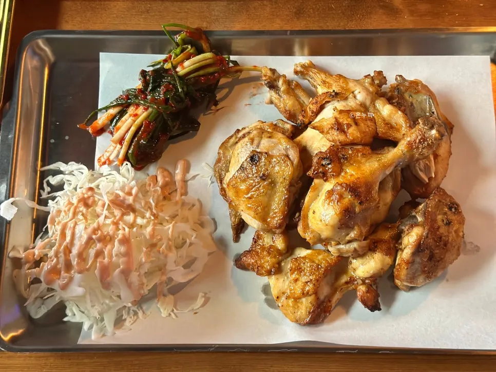 Plate of charcoal-grilled salted chicken barbecue