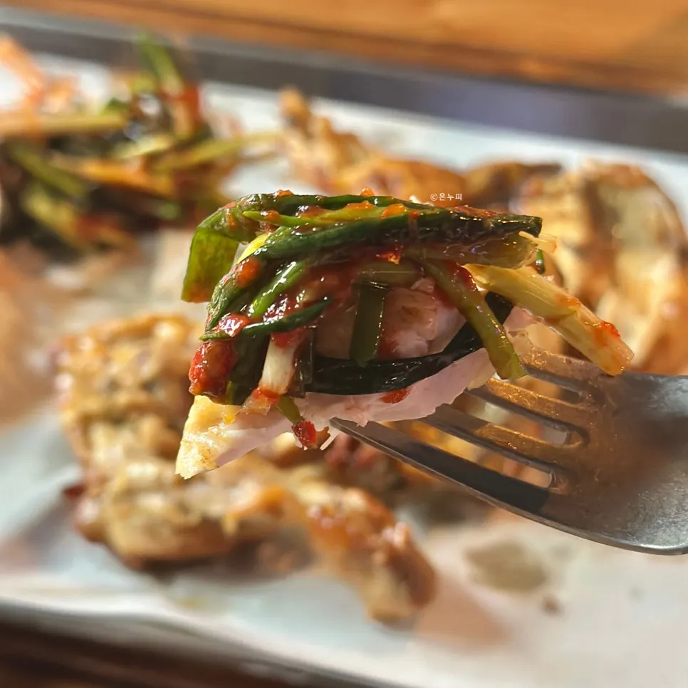 Charcoal-grilled chicken paired with a glass of beer